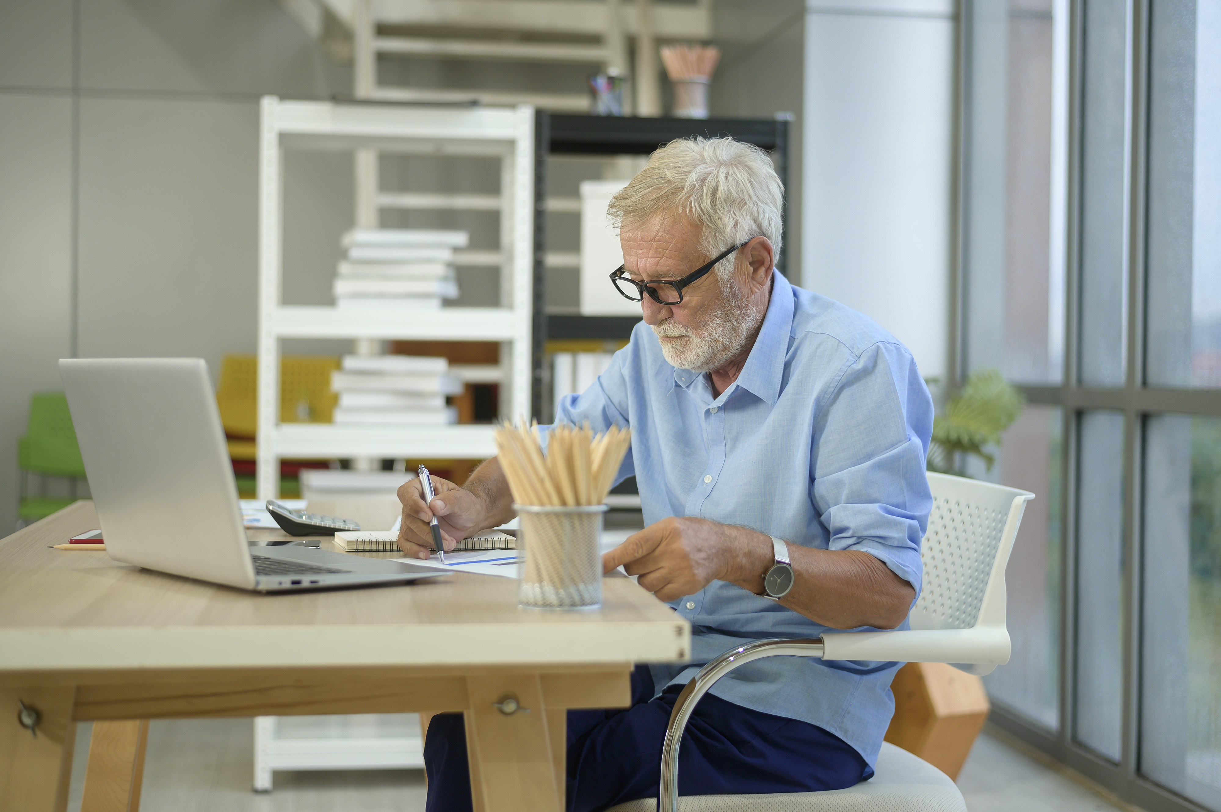 Older businessman working in an office