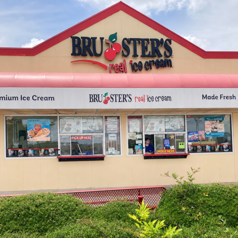 The image depicts the front of Bruster's showing the building, the windows, and the logo